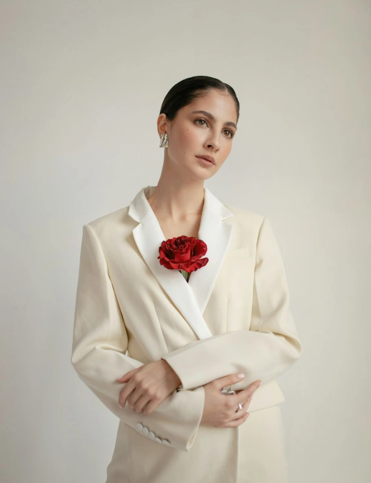 woman wearing white blazer